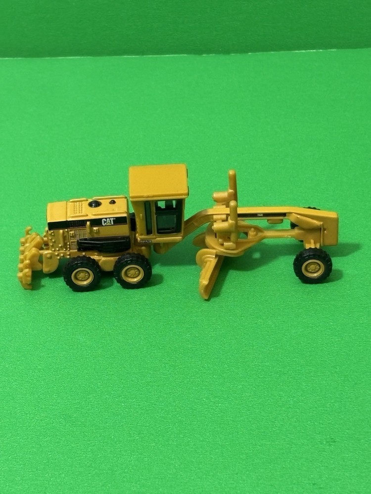 Norscot CAT 163H Motor Grader 1:87 HO Scale Darkish Yellow Caterpillar VHP Plus