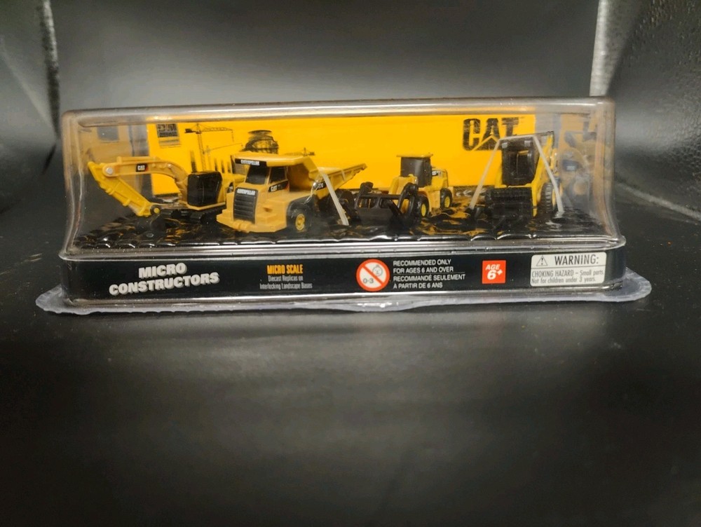 CAT MICRO CONSTRUCTORS BY DIE CAST MASTERS 4 PIECE SET 26155