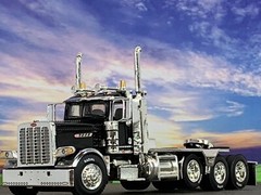 1/64 DCP BLACK PRIDE & CLASS PETERBILT 389 HEAVY HAUL TRI AXLE DAY CAB