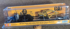 CAT, HO SCALE, SEMI TRUCK AND LOW BOY TRAILER WITH CAT 315C L HYDRALIC EXCAVATOR