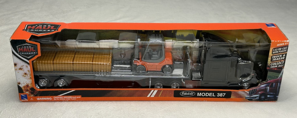 New-Ray 1:43 Long Haul Trucker Peterbilt Flatbed Forklift & Pallets – Model 387