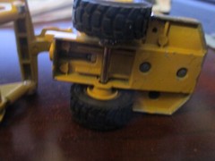 ERTL DIE CAST 5″Caterpillar 613C Wheel Tractor Elevating Scraper, articulating