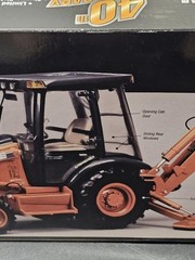ERTL Case 580 Super M Series Backhoe 40th Anniversary 1/16 Chrome Buckets