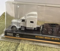 Norscot Peterbilt Model 389 w/ Trail King Lowboy Trailer & Cat 163H Motor Grader
