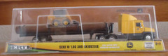 JOHN DEERE – ERTL, SEMI W/ LOG AND SKIDSTEER (37382); (unopened original box)