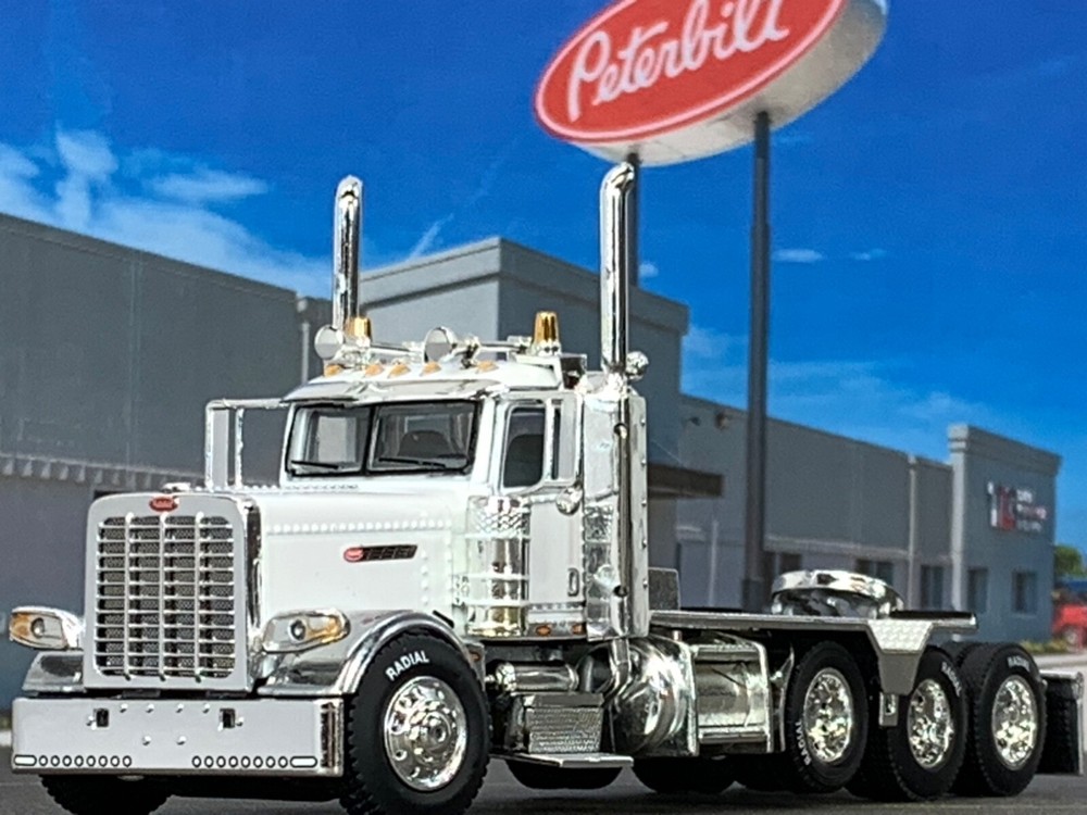 1/64 DCP WHITE PRIDE & CLASS PETERBILT 389 HEAVY HAUL TRI AXLE DAY CAB