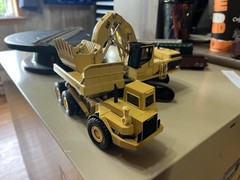 1/50th Scale Ertl Caterpillar 5080 shovel, D350D articulated truck